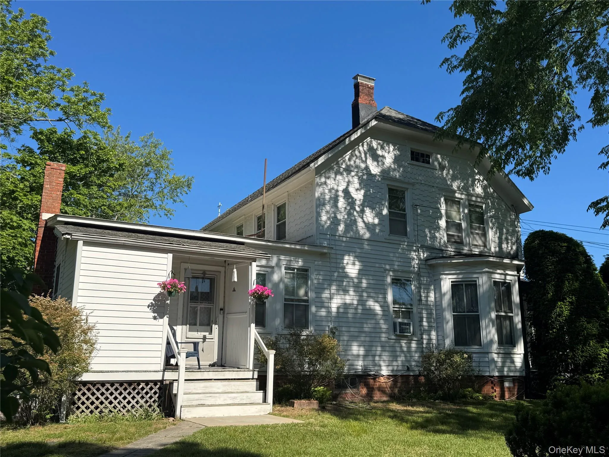 Legal 4 family home on the property. Legal 4 family home on the property.