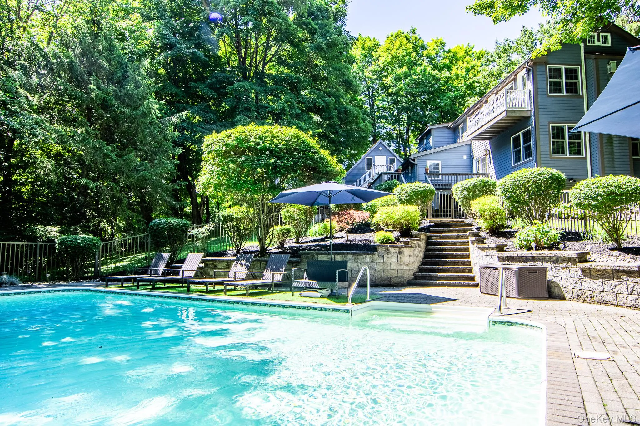 Inground heated salt water poolwith beautiful landscaping Inground heated salt water poolwith beautiful landscaping