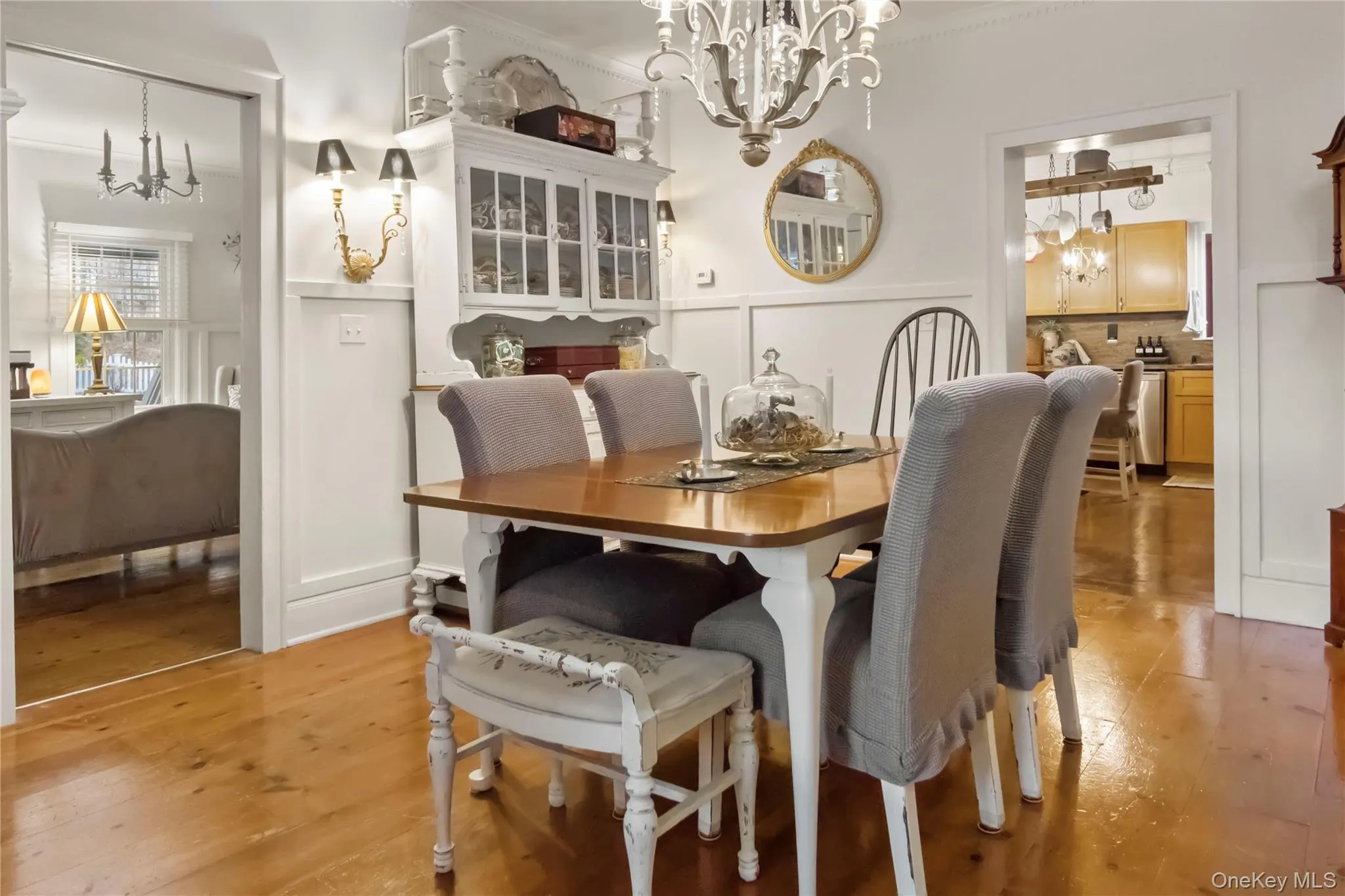 Formal Dining Room with hardwood floors open to the kitchen and formal living room Formal Dining Room with hardwood floors open to the kitchen and formal living room
