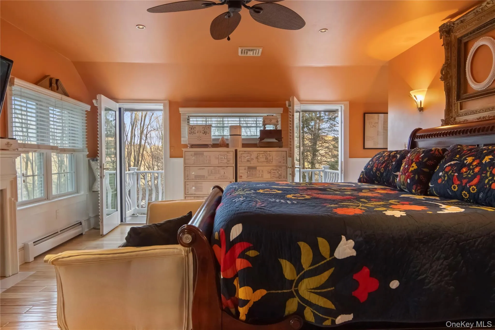 Primary Bedroom with private balcony and propane fireplace Primary Bedroom with private balcony and propane fireplace