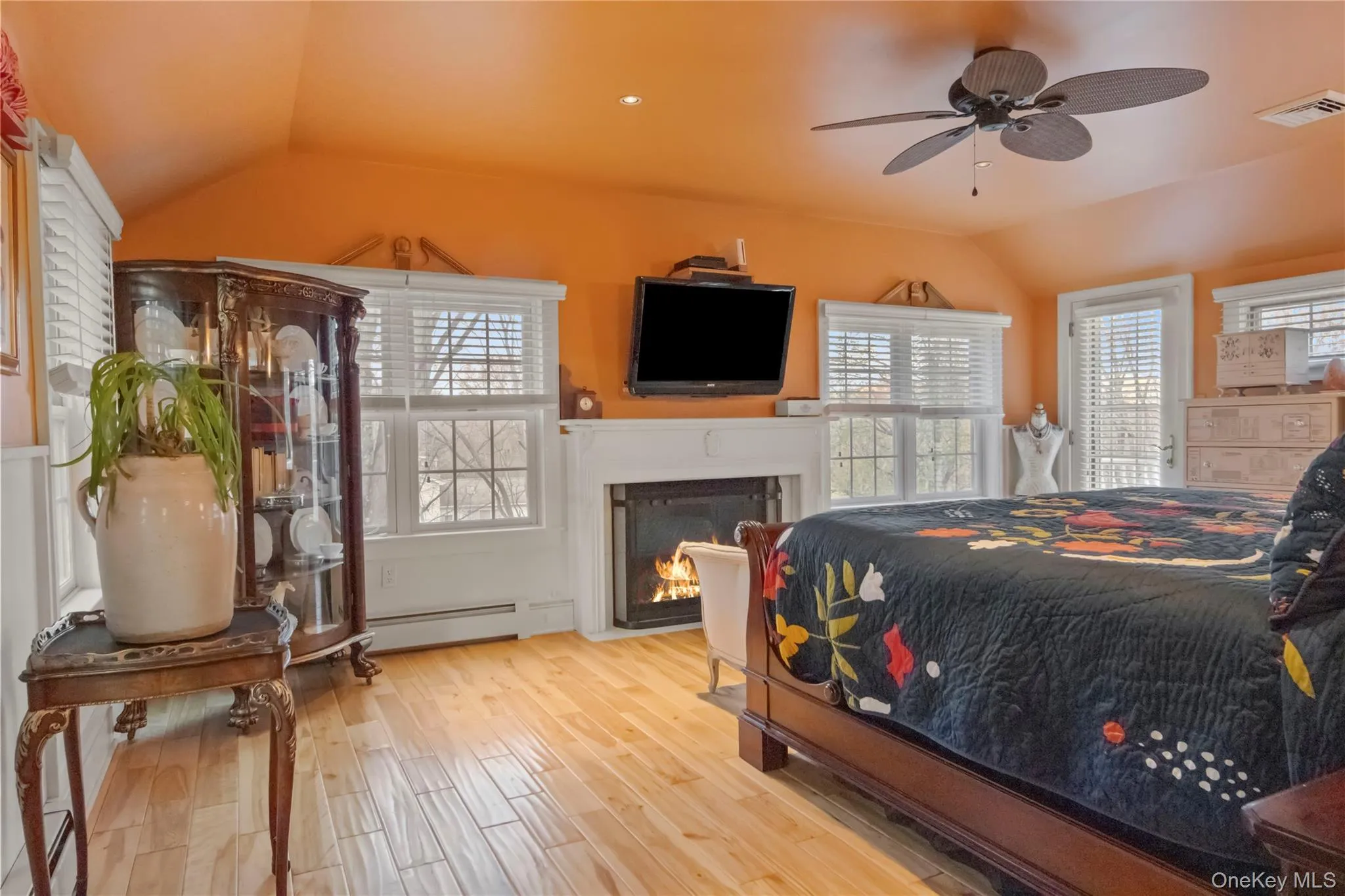 Primary Bedroom with private balcony and propane fireplace Primary Bedroom with private balcony and propane fireplace