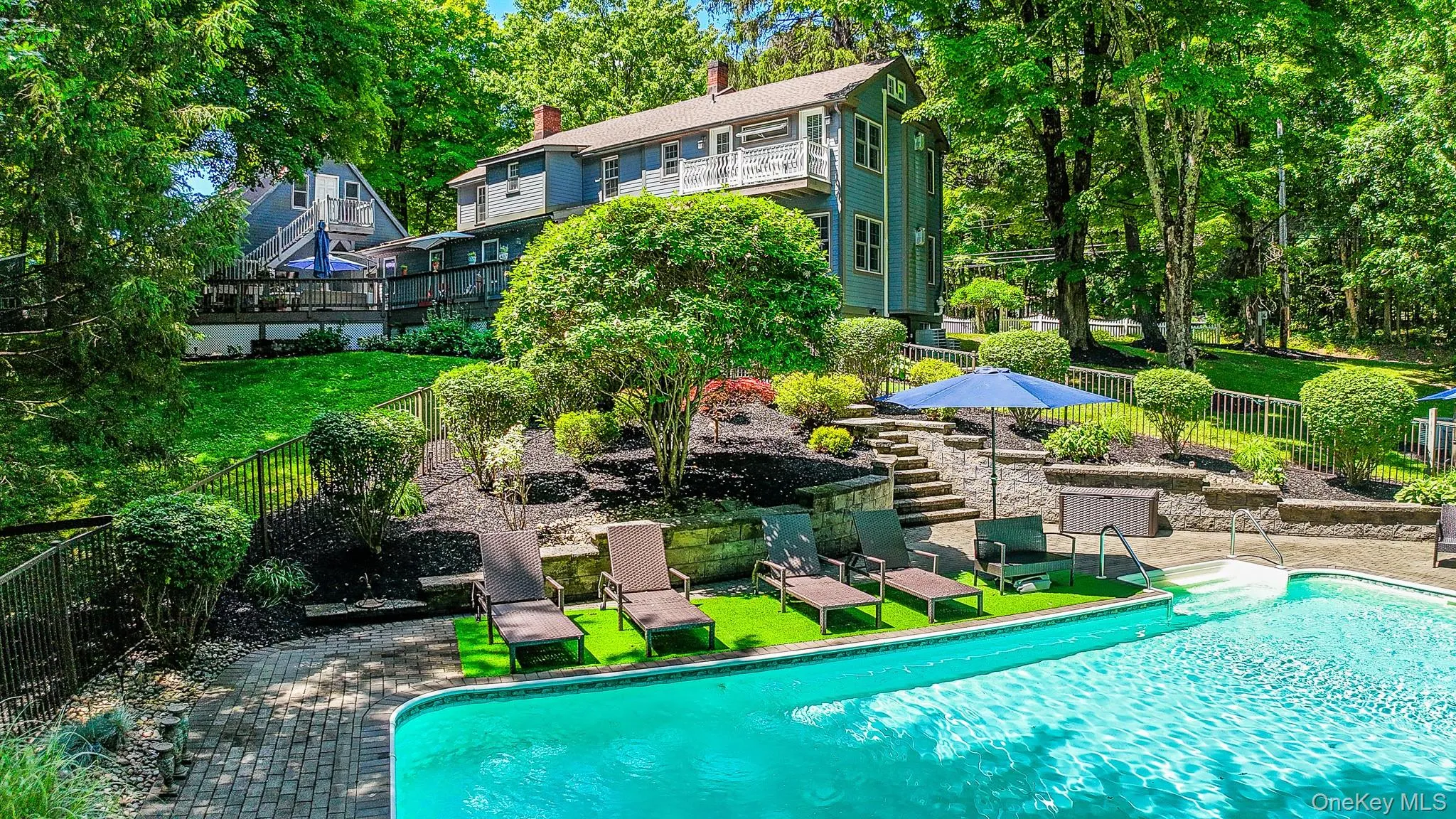 Inground heated salt water poolwith beautiful landscaping Inground heated salt water poolwith beautiful landscaping