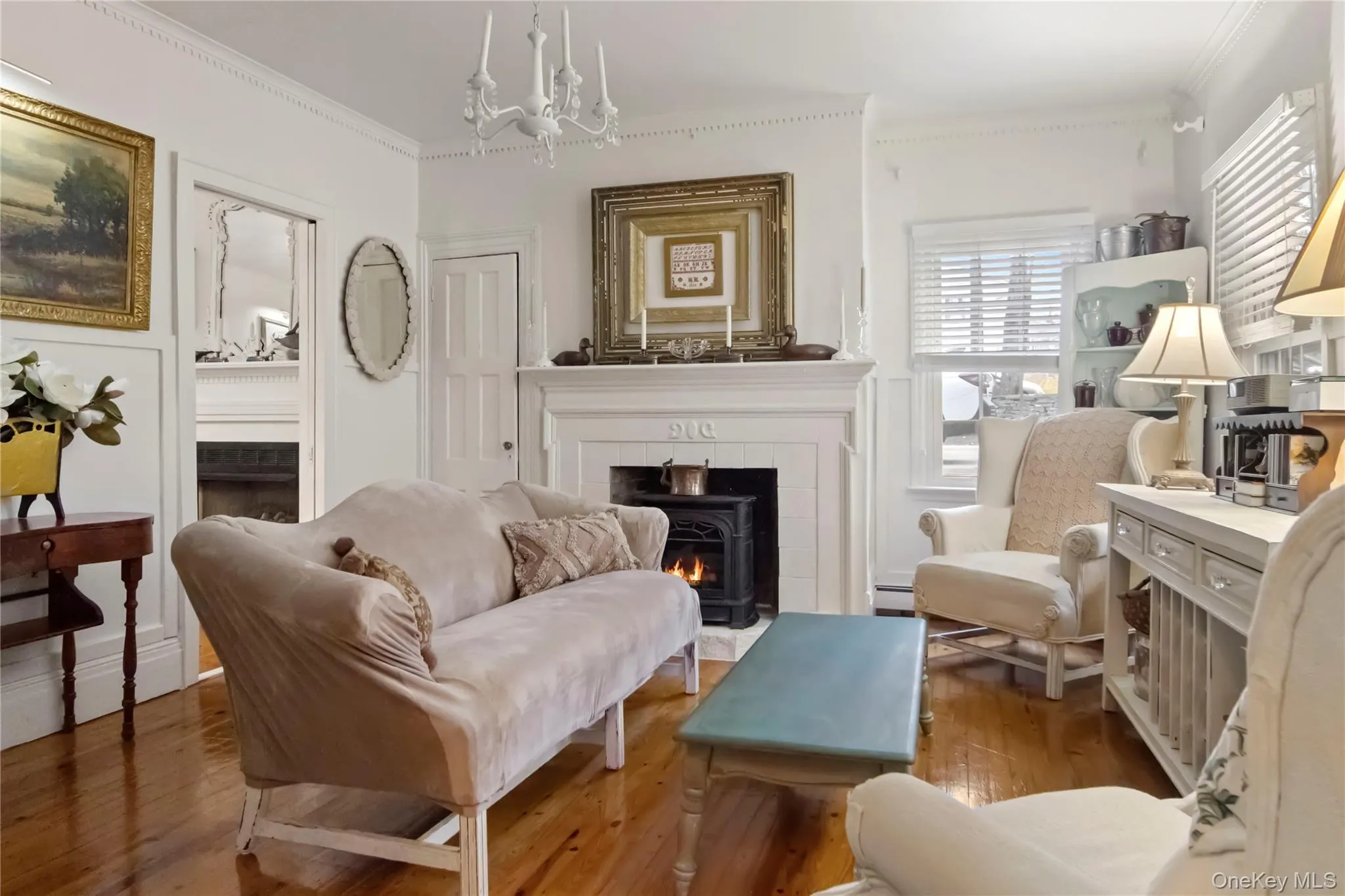 Formal Living Room with hardwood floors and propane fireplace Formal Living Room with hardwood floors and propane fireplace