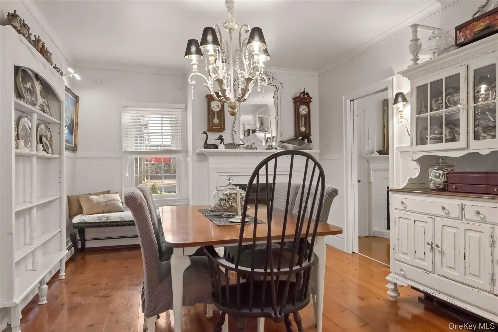 Formal Dining Room with hardwood floors open to the kitchen and formal living room Formal Dining Room with hardwood floors open to the kitchen and formal living room