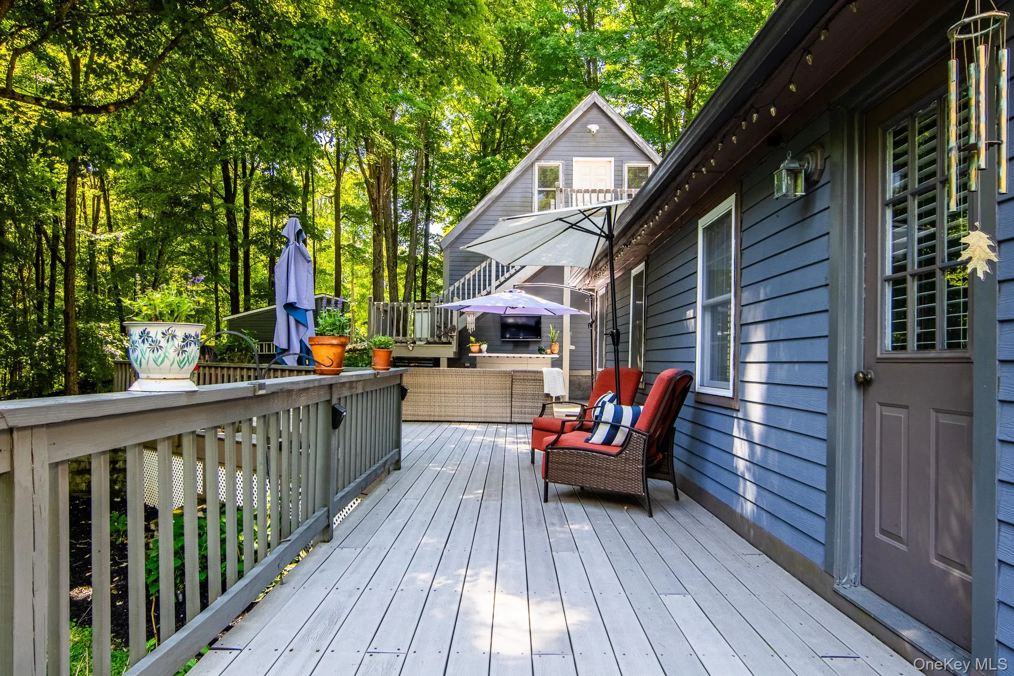 Huge Deck made of composite materials that runs thru the whole back of the house Huge Deck made of composite materials that runs thru the whole back of the house
