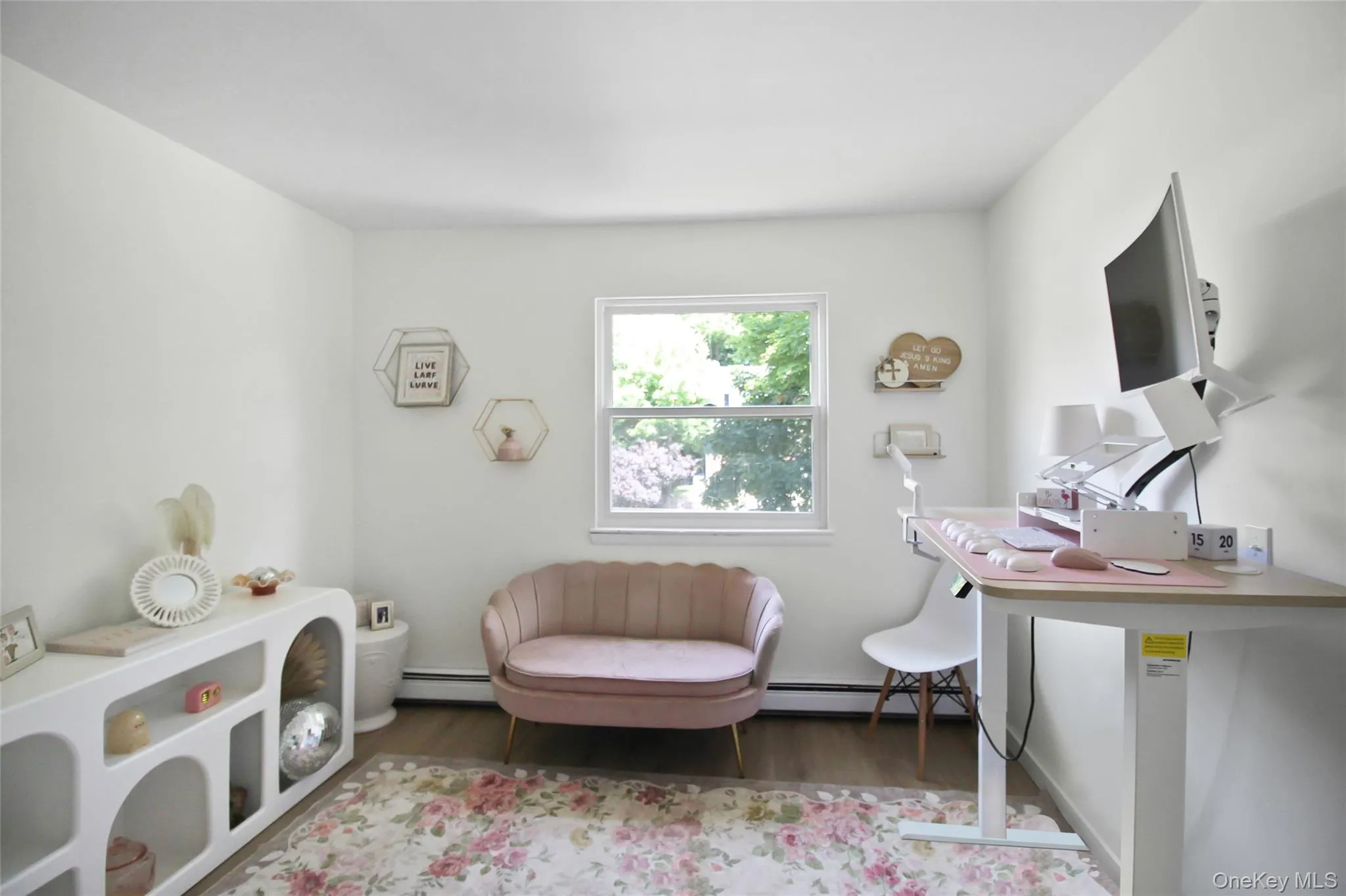 Bedroom being used as an office space Bedroom being used as an office space