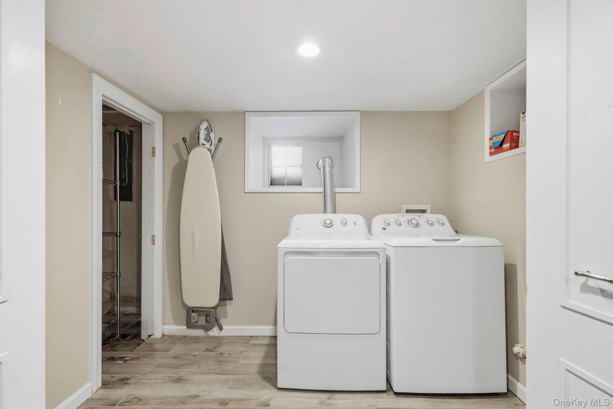 Large laundry room with additional storage Large laundry room with additional storage