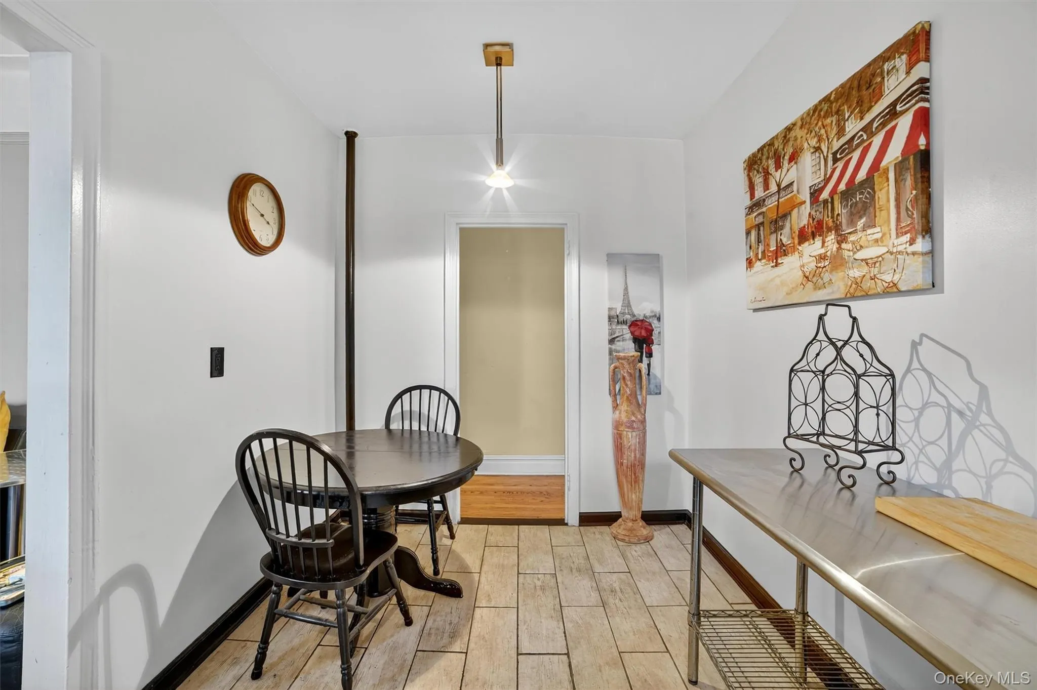 Dining space featuring wood finish floors and baseboards Dining space featuring wood finish floors and baseboards