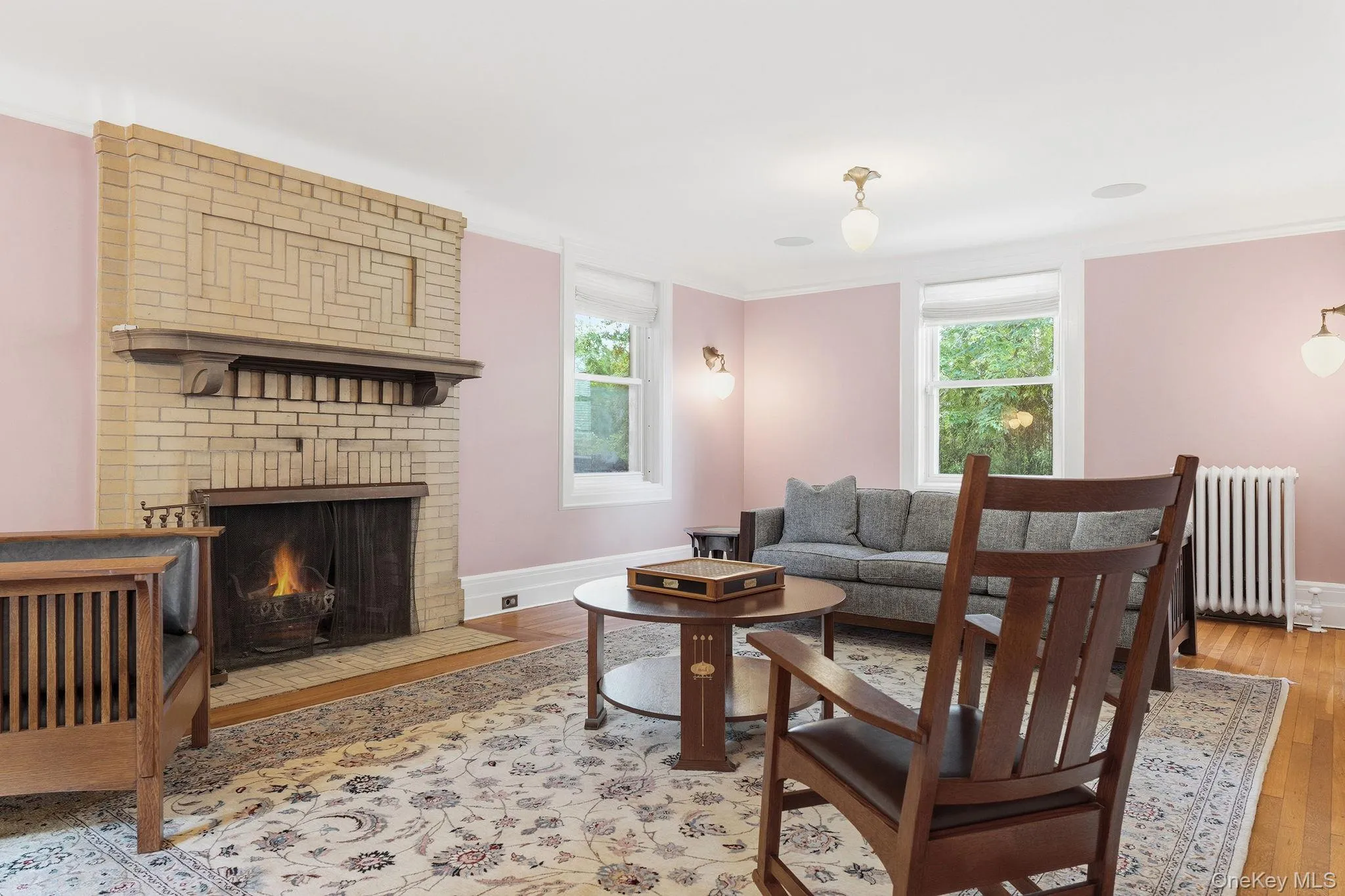 Gather around the warmth of a classic wood-burning fireplace. Gather around the warmth of a classic wood-burning fireplace.
