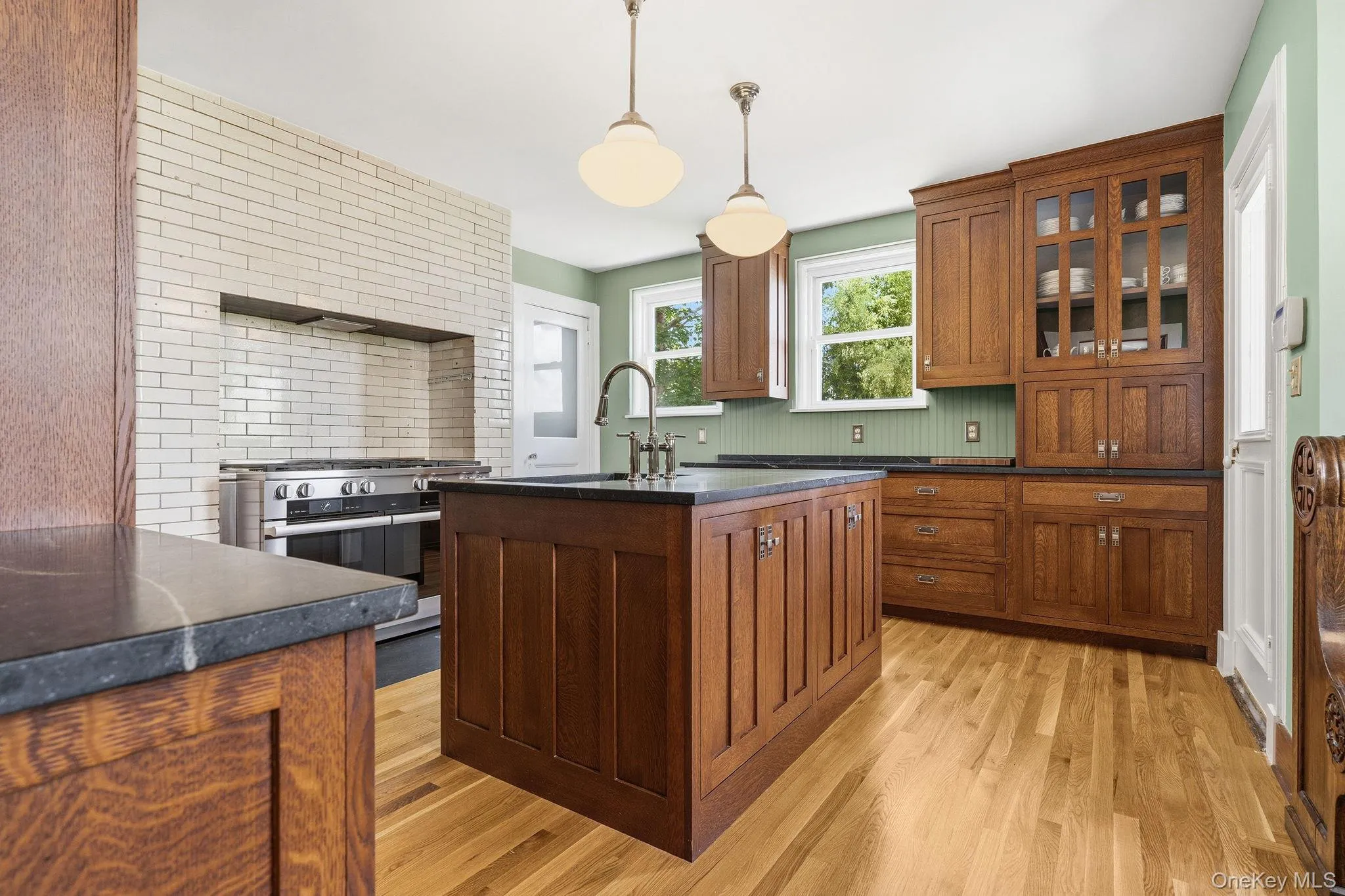 Soapstone counters, handcrafted cabinetry, and premium appliances. Soapstone counters, handcrafted cabinetry, and premium appliances.