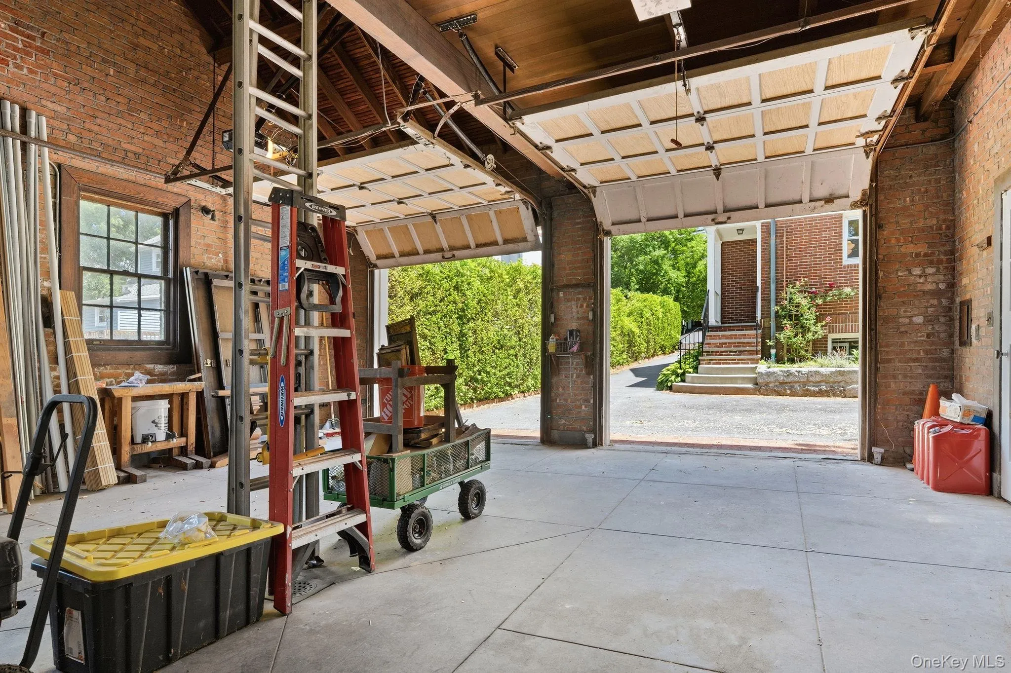 A detached two-car garage with soaring ceilings and exceptional storage. A detached two-car garage with soaring ceilings and exceptional storage.