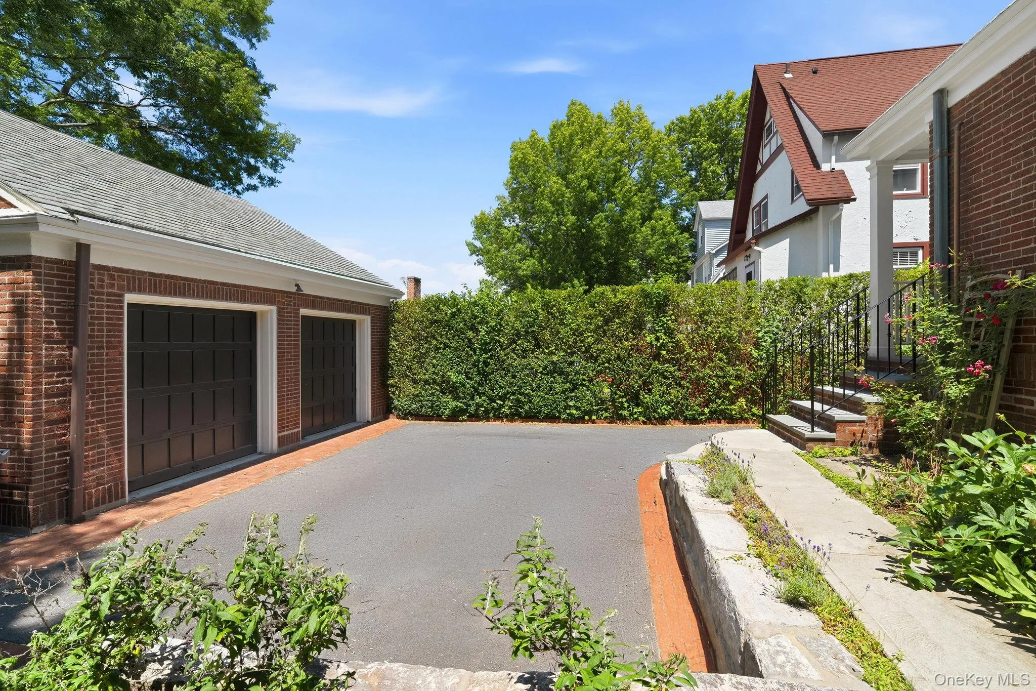 A detached two-car garage with soaring ceilings and exceptional storage. A detached two-car garage with soaring ceilings and exceptional storage.