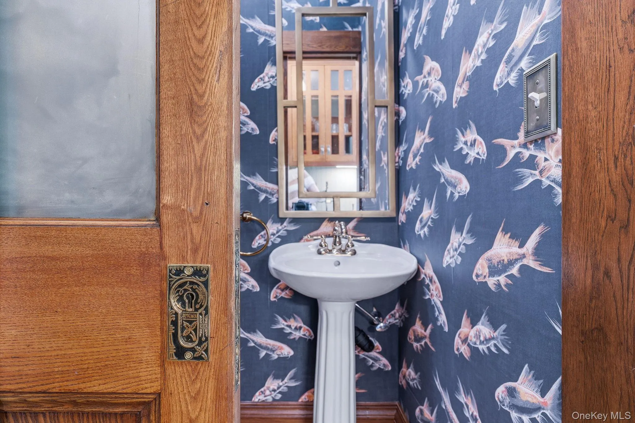 Main Floor Powder Room- Beautifully appointed with timeless style. Main Floor Powder Room- Beautifully appointed with timeless style.