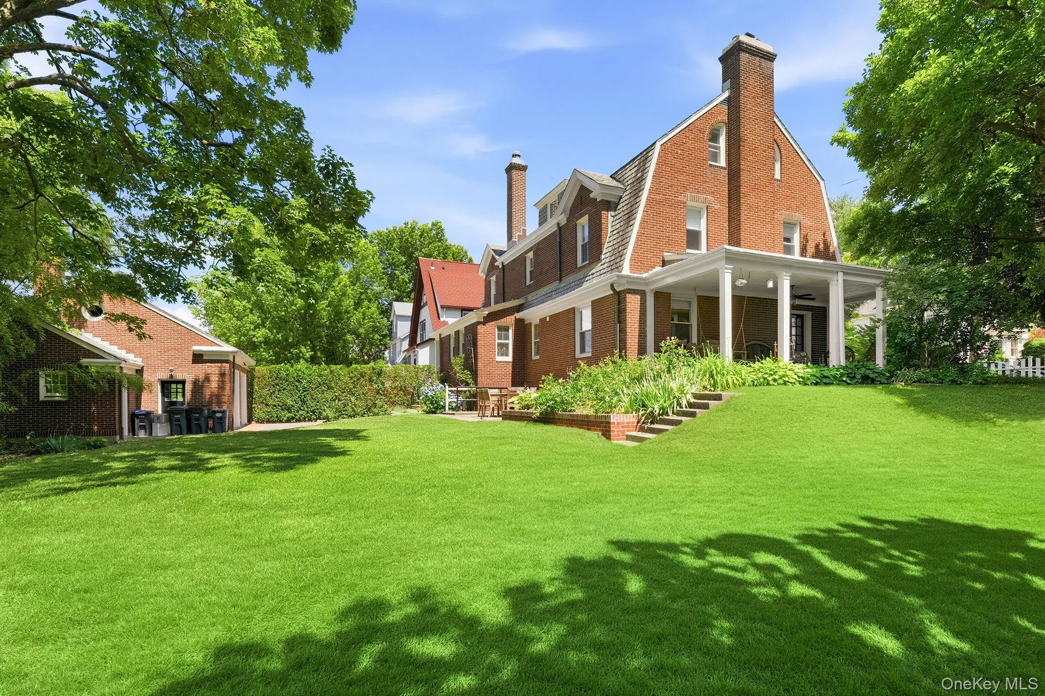 Lush landscaping creates a backyard you'll never want to leave. Lush landscaping creates a backyard you'll never want to leave.