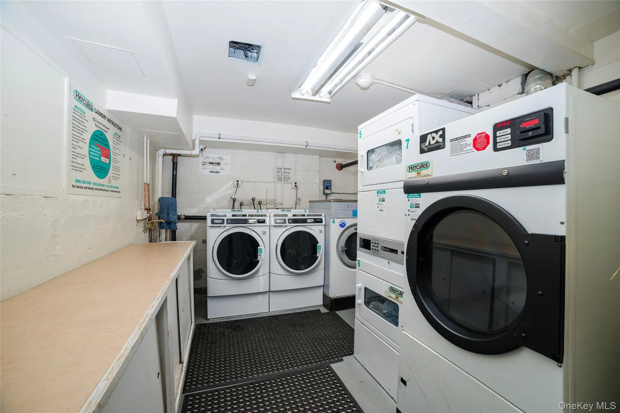 One out of the two shared laundry facilities One out of the two shared laundry facilities