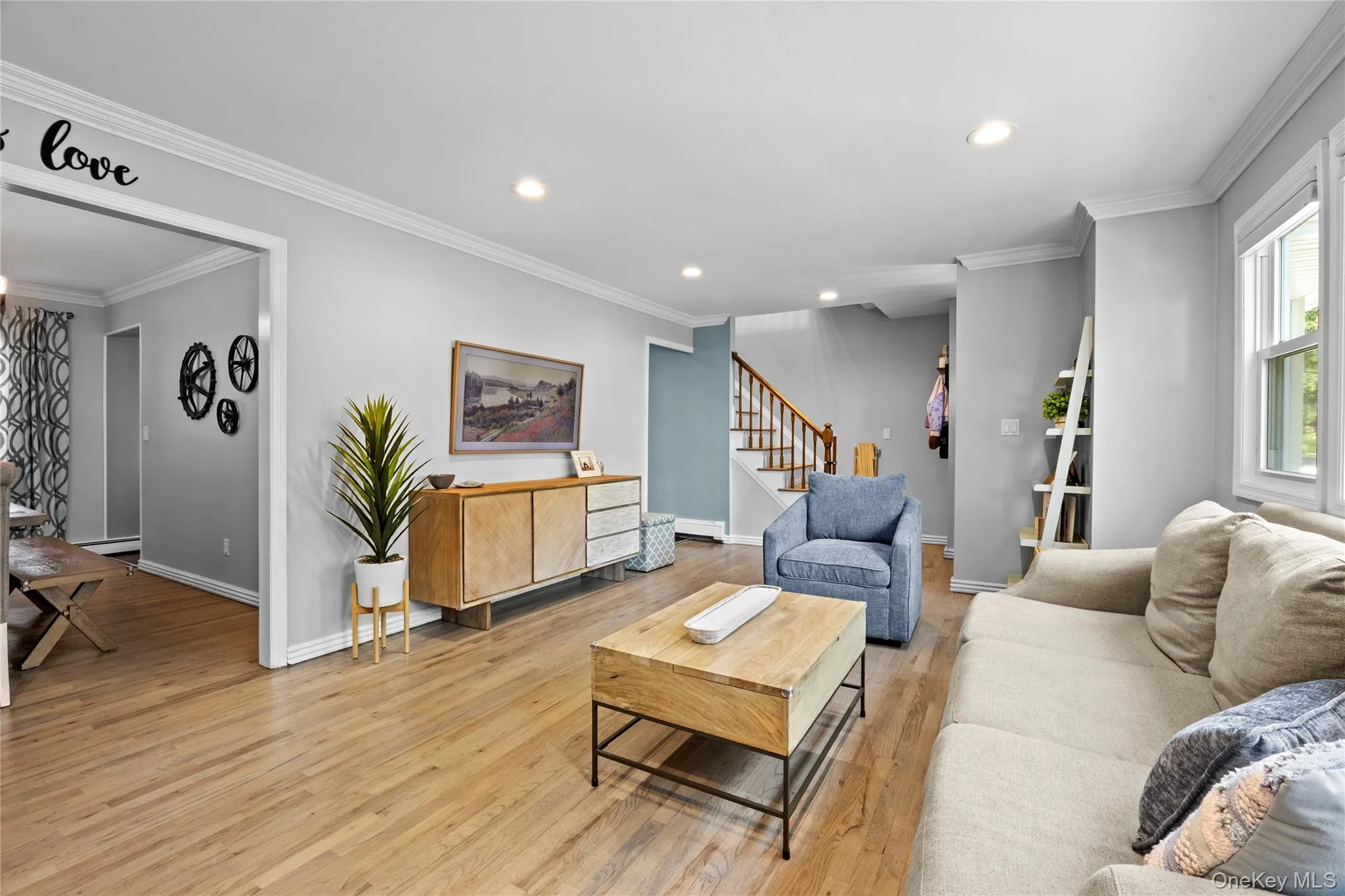 Living room with easy access to dining room and front entry Living room with easy access to dining room and front entry