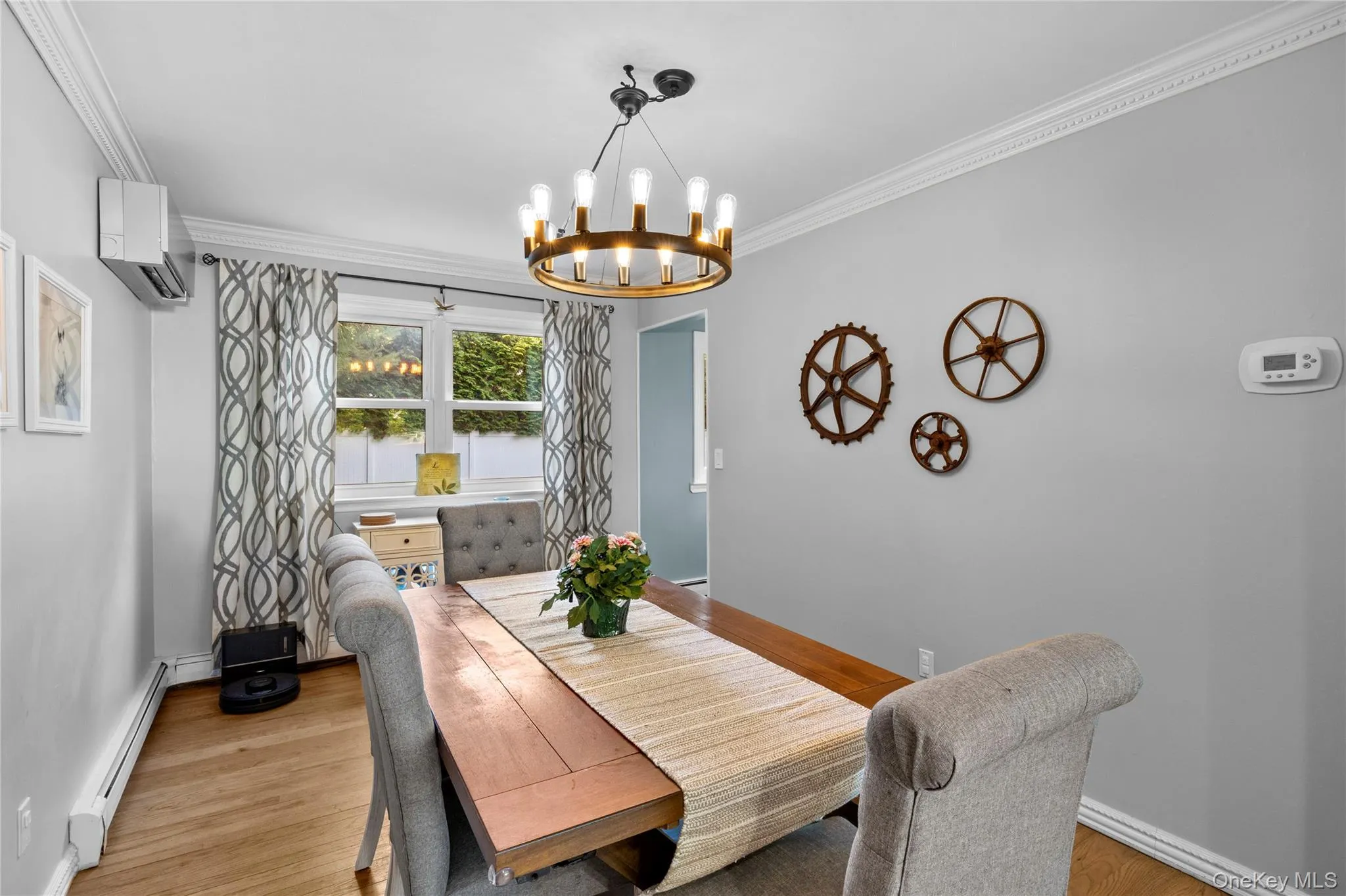Room for entertaining, windows to backyard, entry to kitchen Room for entertaining, windows to backyard, entry to kitchen