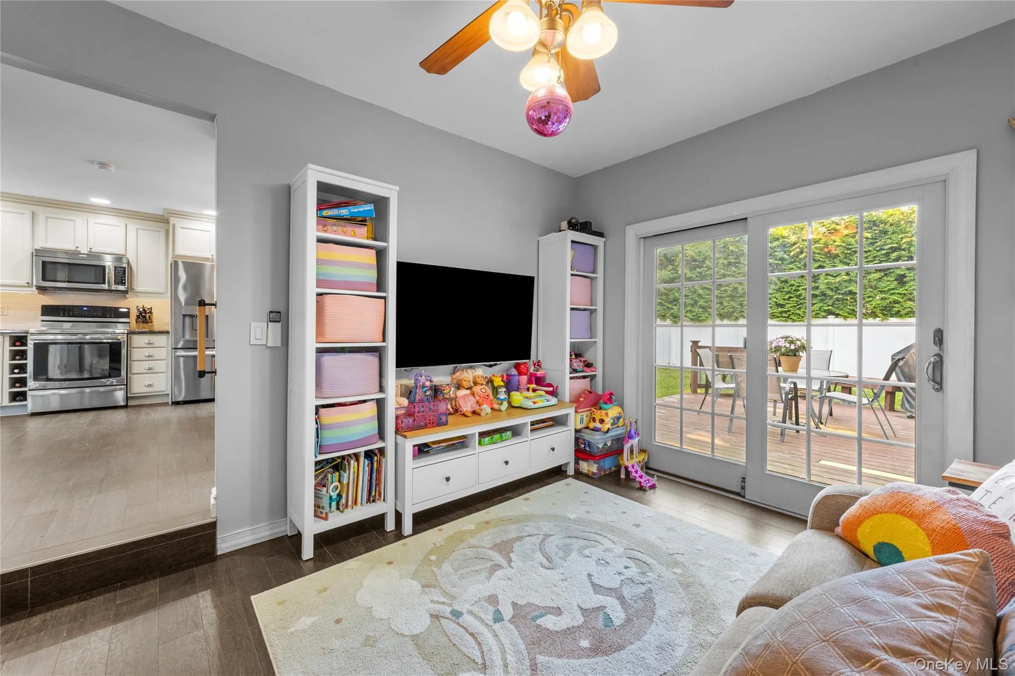 Easy access to kitchen, space to play or relax and sliders to yardspace Easy access to kitchen, space to play or relax and sliders to yardspace