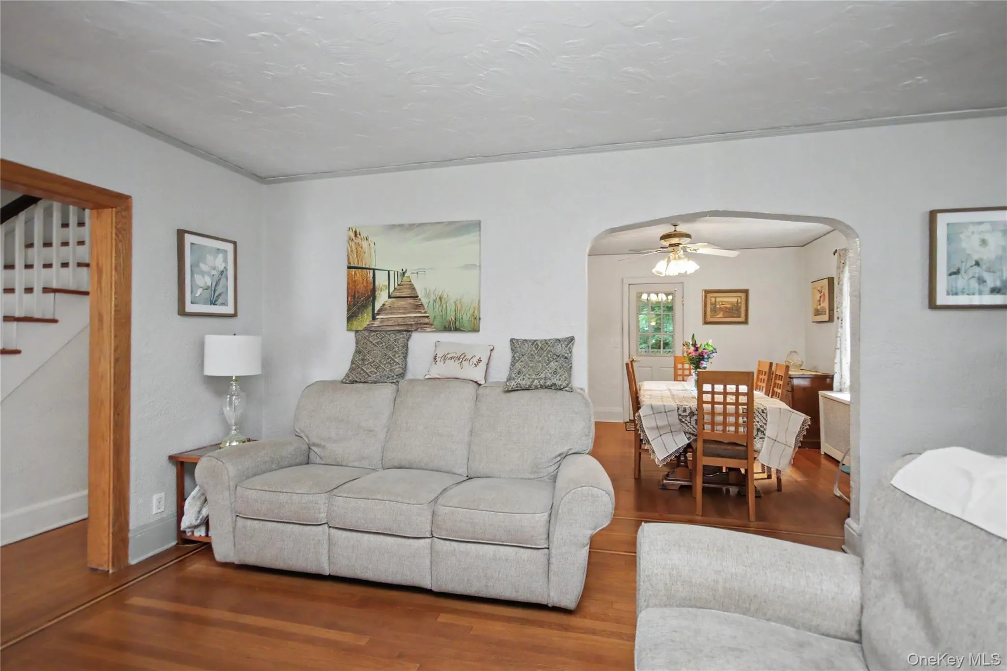 Living room looking onto formal dining room. Living room looking onto formal dining room.