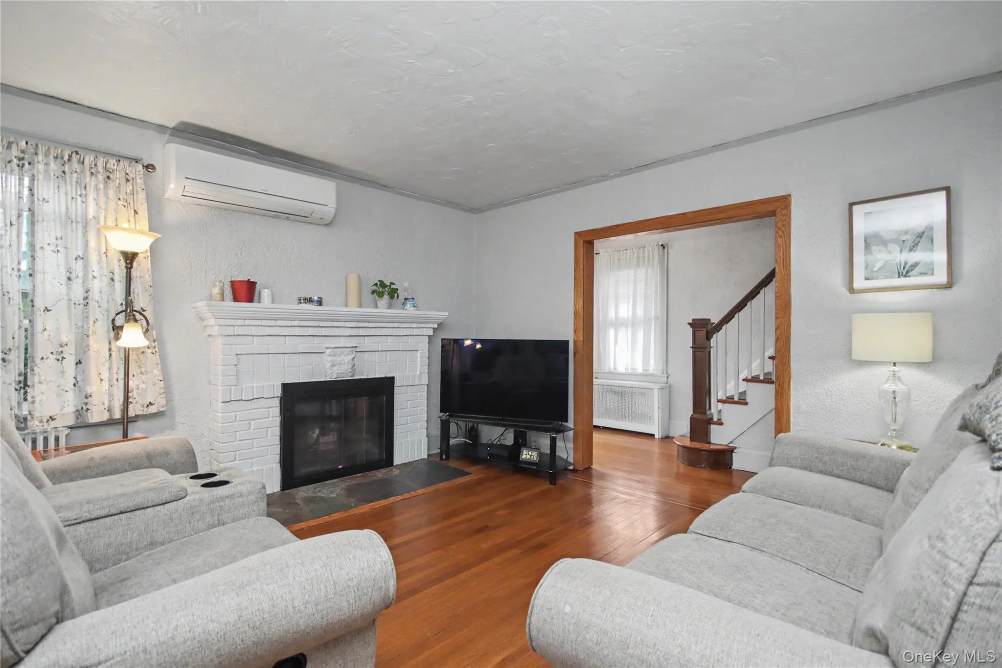 Living room with fireplace. Living room with fireplace.