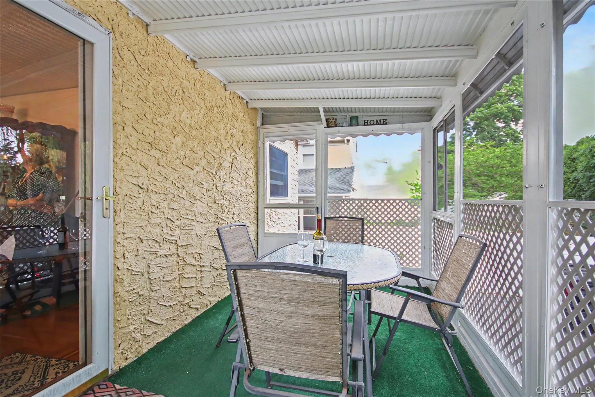 Screened-in back porch is accessible from dining room and door to back yard, too. Screened-in back porch is accessible from dining room and door to back yard, too.