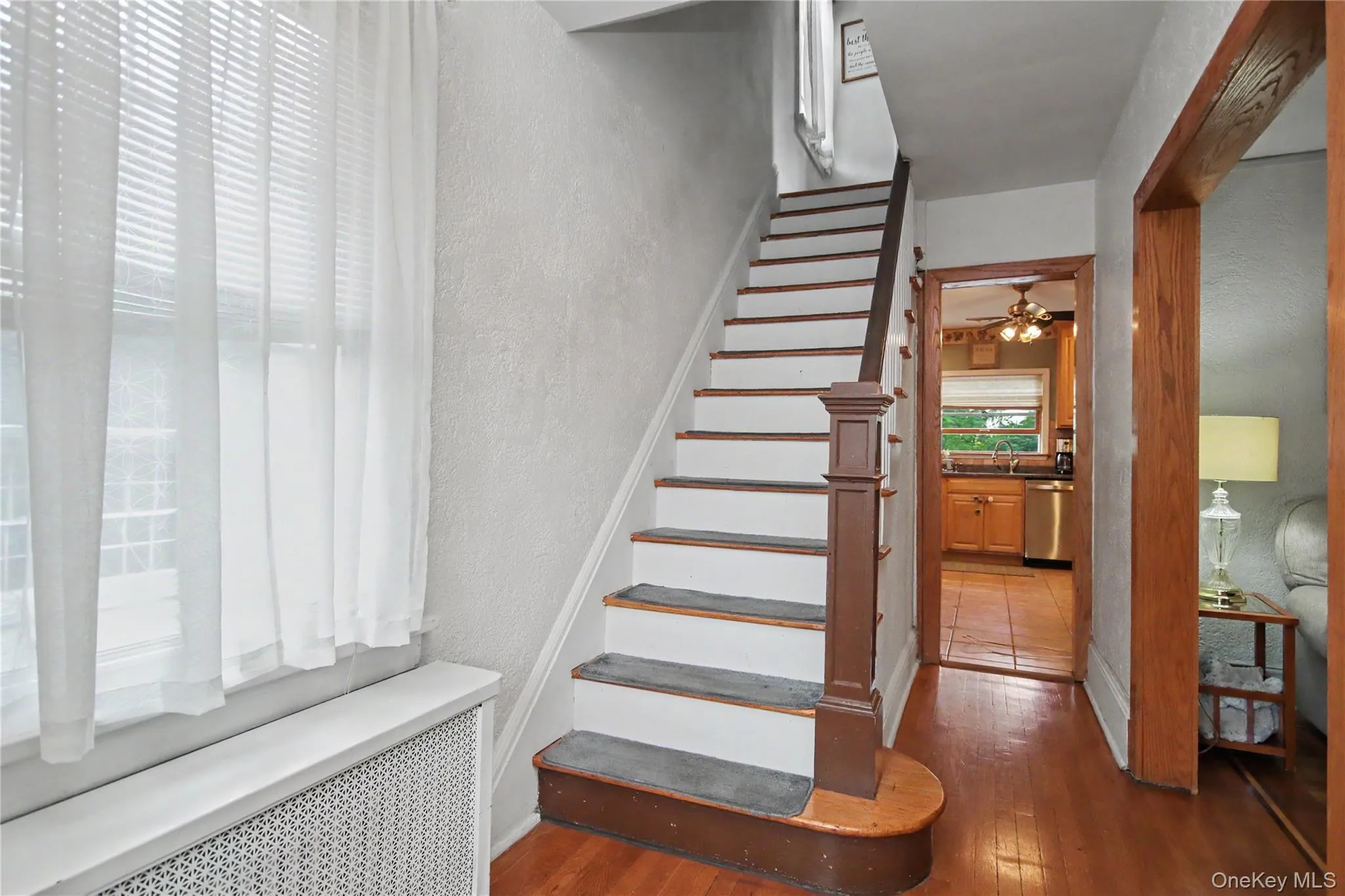 Entrance foyer with direct access to living room and kitchen. Entrance foyer with direct access to living room and kitchen.