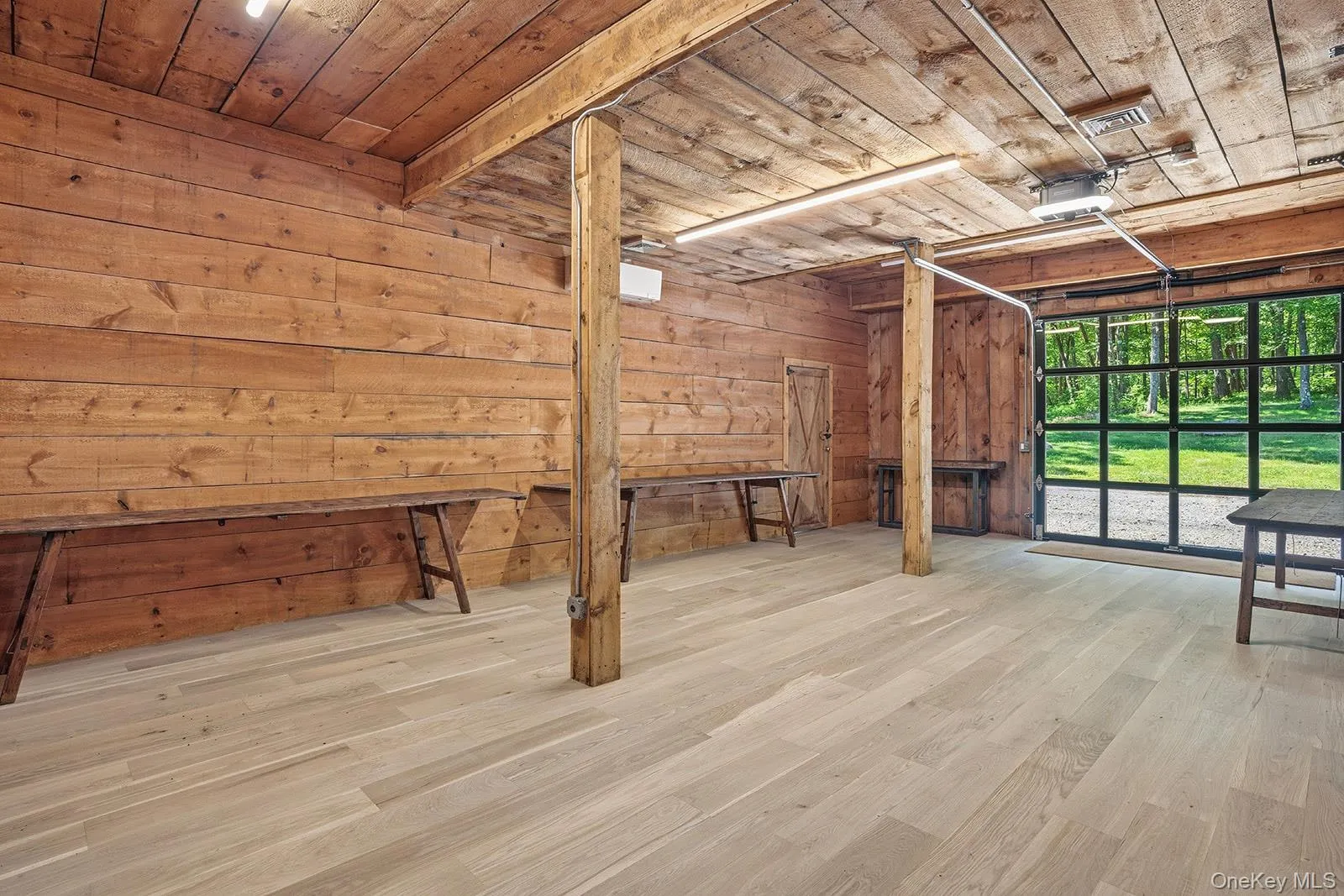 Barn studio space filled with light, glass garage door Barn studio space filled with light, glass garage door