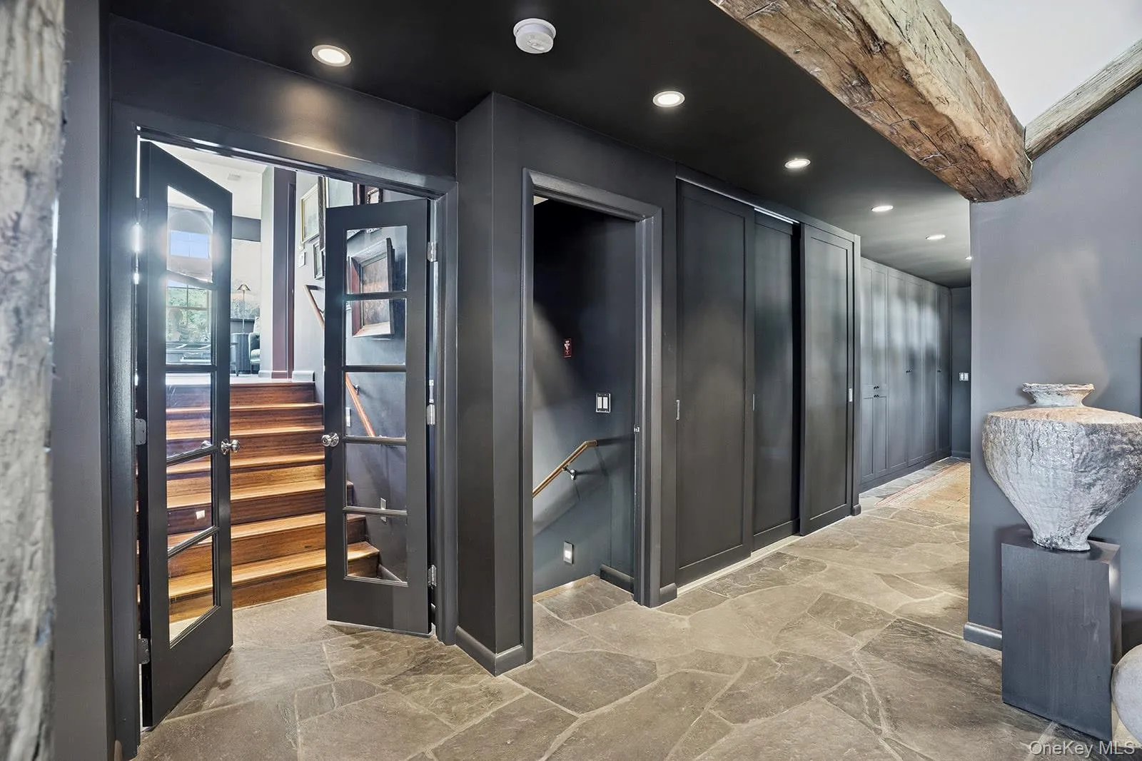 From garage, wood doors create a seamless hallway, From garage, wood doors create a seamless hallway,