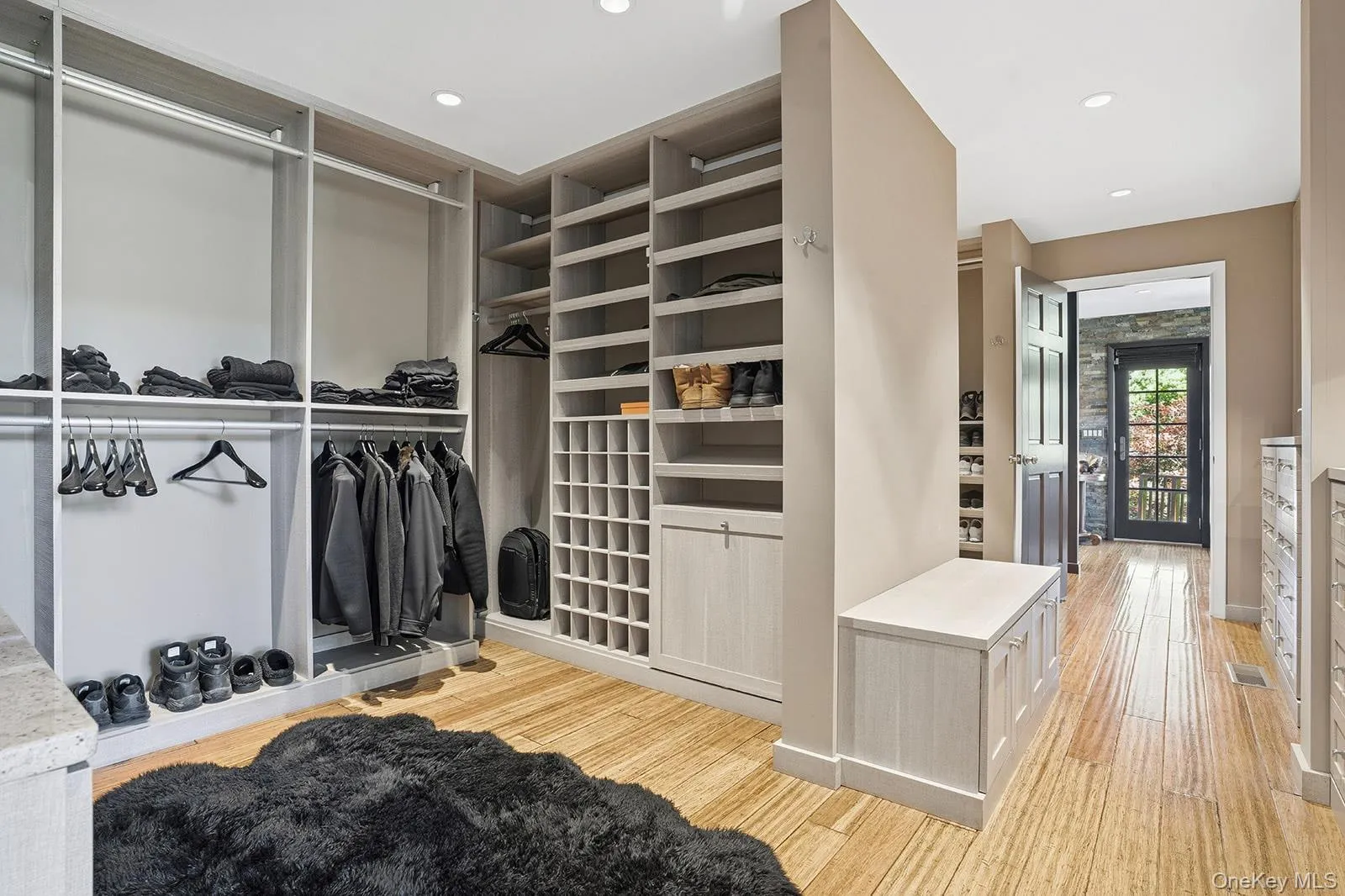 Expansive dressing room with double closets Expansive dressing room with double closets
