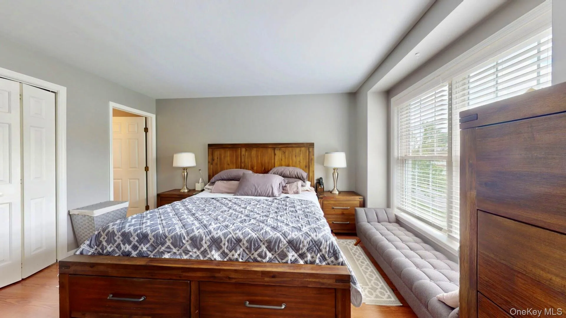 Bedroom featuring light wood-style flooring Bedroom featuring light wood-style flooring