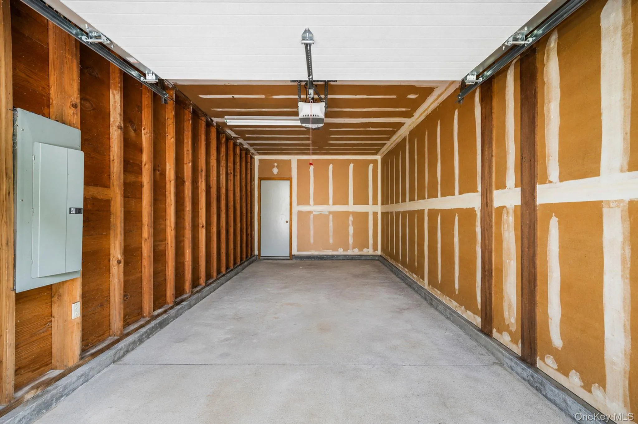 Single Car Garage with Storage Entrance Single Car Garage with Storage Entrance