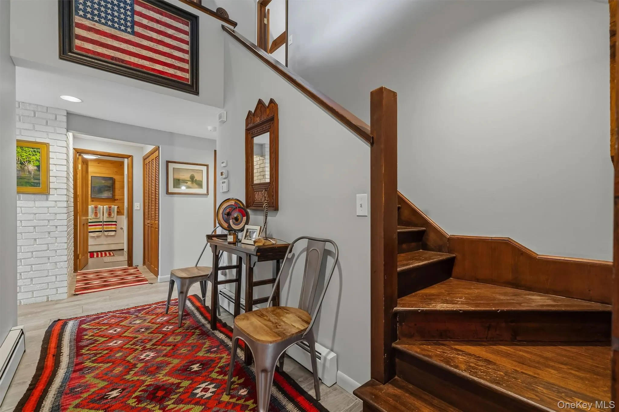 Entry hallway. Stairs to primary and loft Entry hallway. Stairs to primary and loft