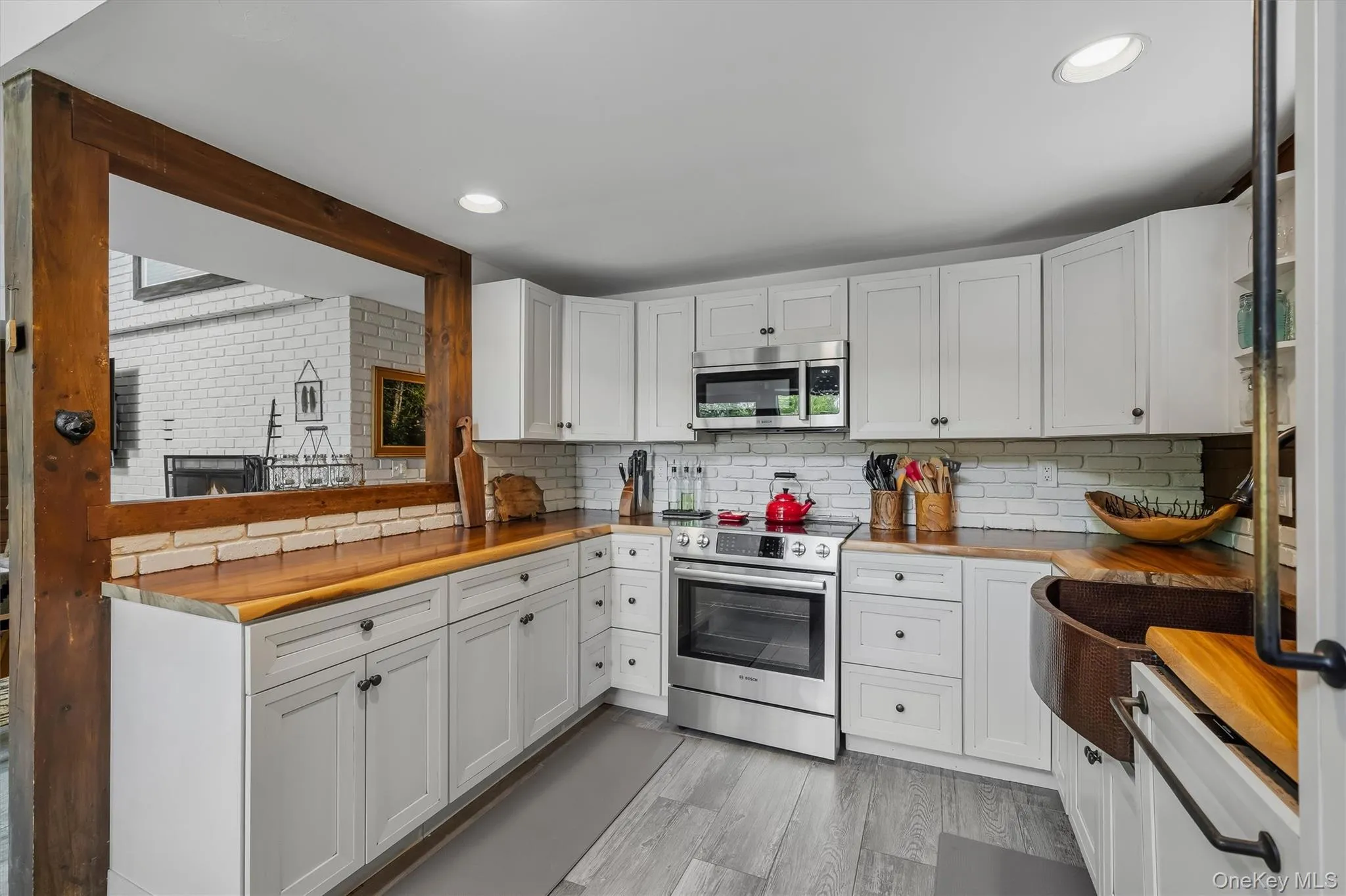 custom butcher block counters, Bosch appliances, copper sink custom butcher block counters, Bosch appliances, copper sink