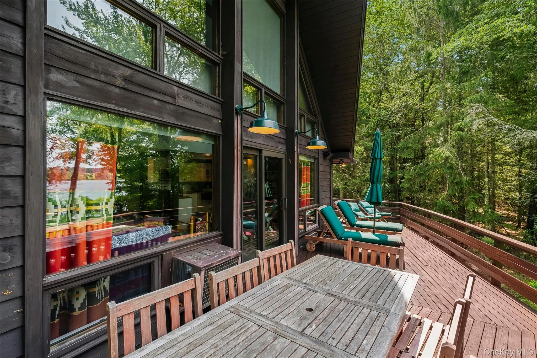 lake view deck with dining area and lounge area lake view deck with dining area and lounge area