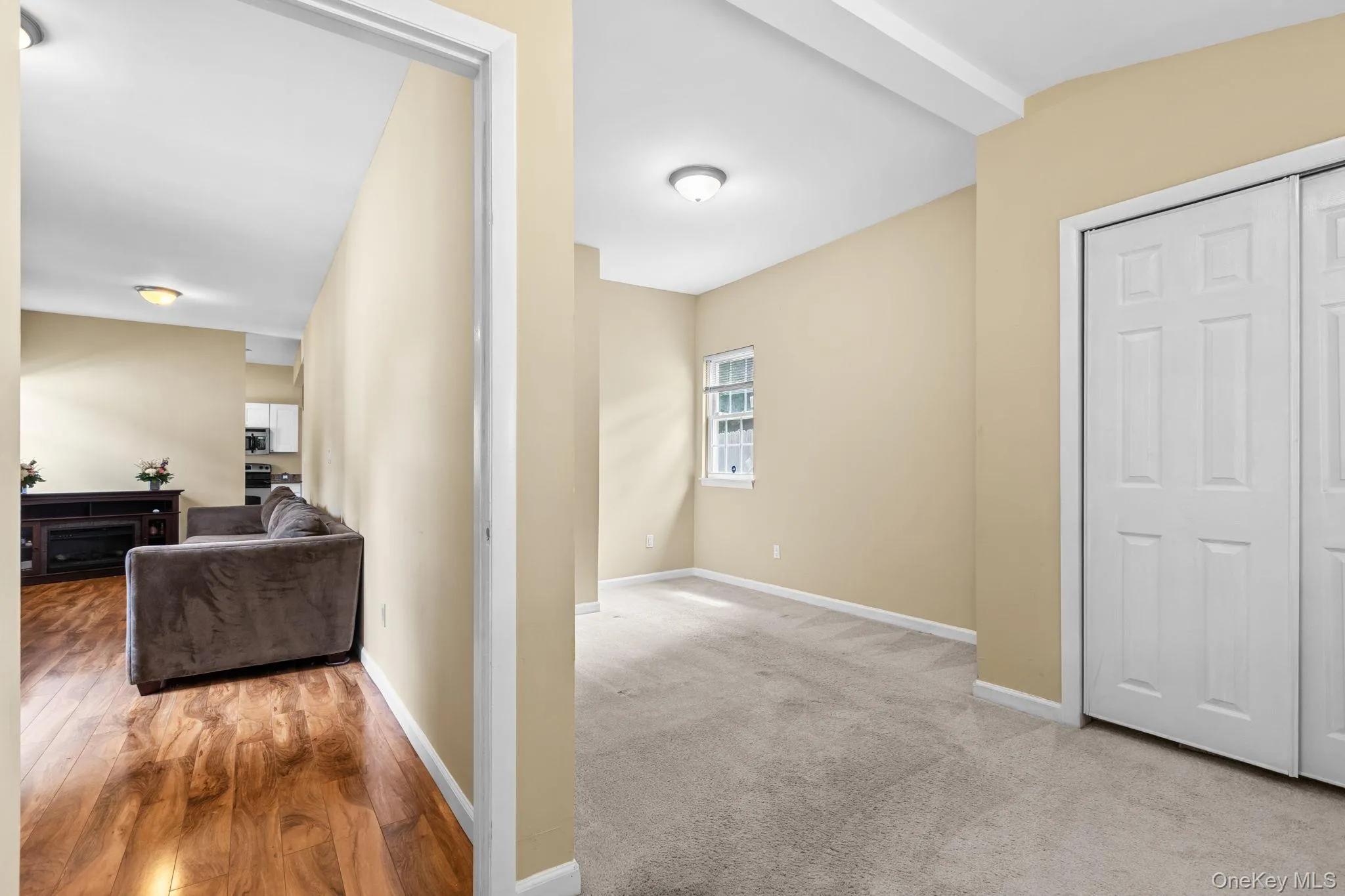 Neutral-toned walls and light-colored carpeting define this bedroom. Built-in closet and previously accomodated a Queen size bedroom set. Neutral-toned walls and light-colored carpeting define this bedroom. Built-in closet and previously accomodated a Queen size bedroom set.