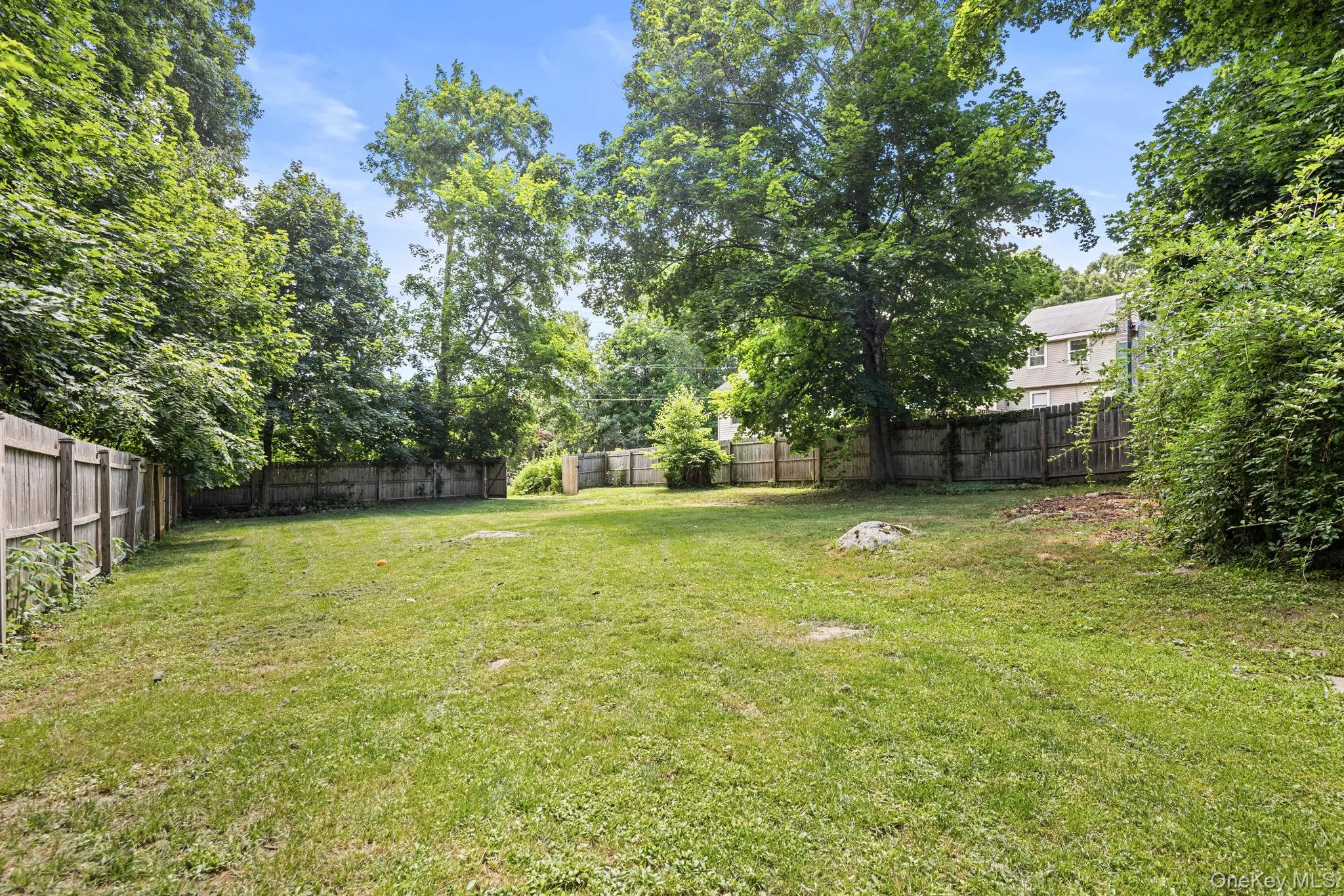 Large fenced in yard with lots of room for outside activities. Large fenced in yard with lots of room for outside activities.