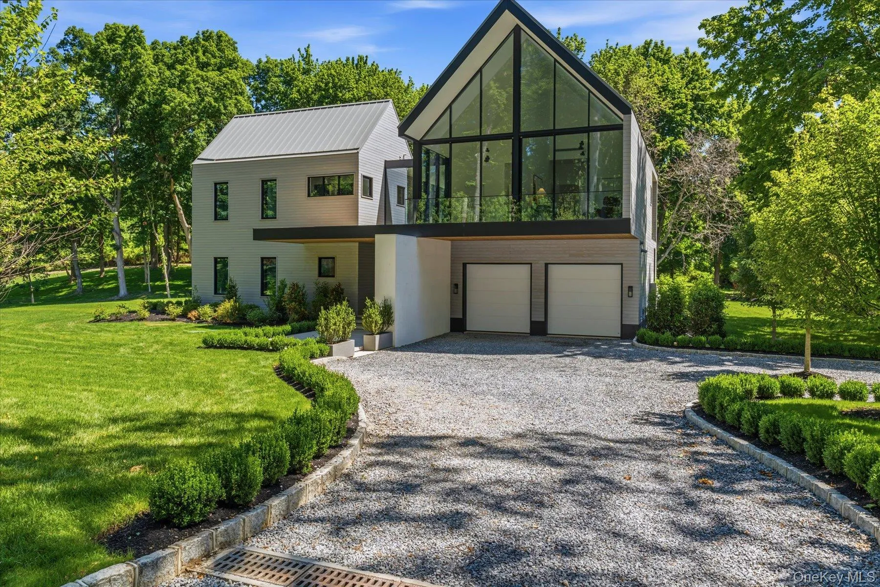 Front Entry with striking contemporary architecture and two car garage Front Entry with striking contemporary architecture and two car garage
