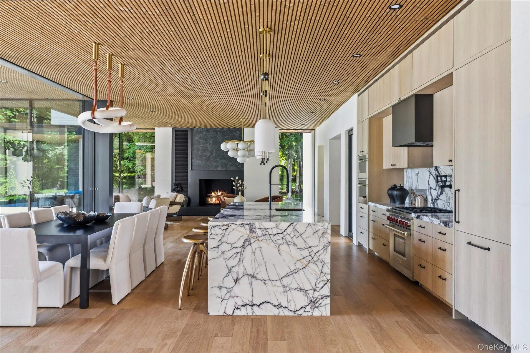 Kitchen with Wolf appliances, Luna wood ceiling and 7” white oak flooring Kitchen with Wolf appliances, Luna wood ceiling and 7” white oak flooring