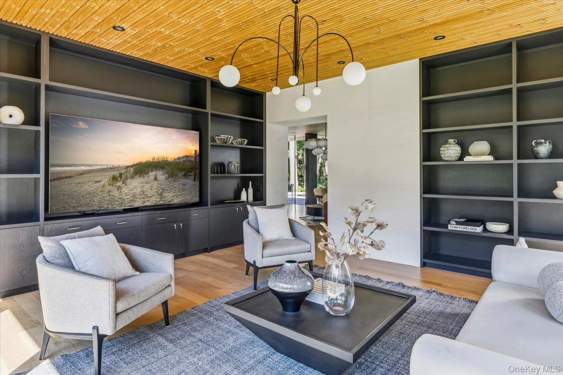 Den with beautiful custom built-ins Den with beautiful custom built-ins