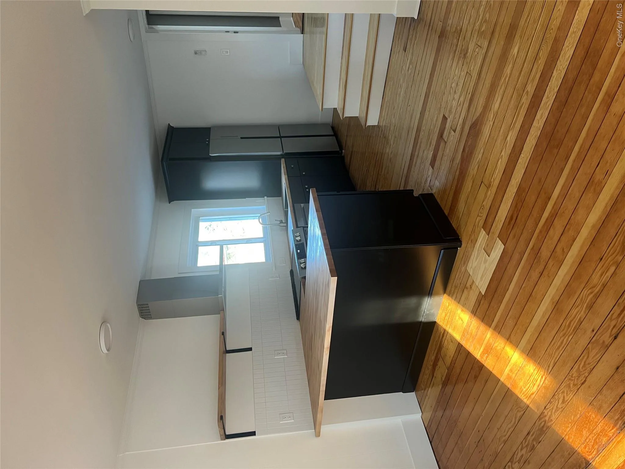 Apartment #2 - remodeled kitchen with wood floors Apartment #2 - remodeled kitchen with wood floors