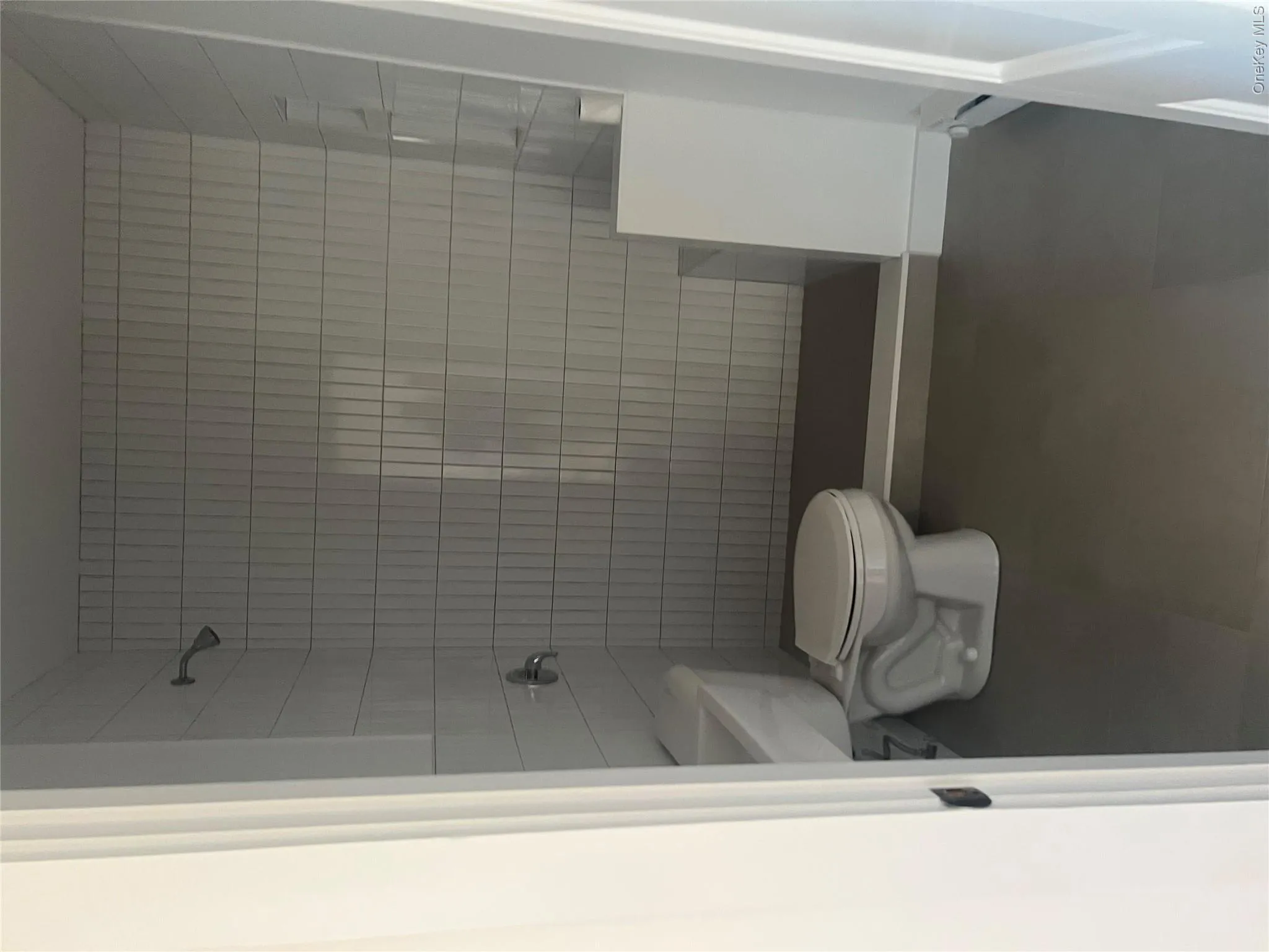 Apartment #2 Remodeled tiled bathroom with shower Apartment #2 Remodeled tiled bathroom with shower