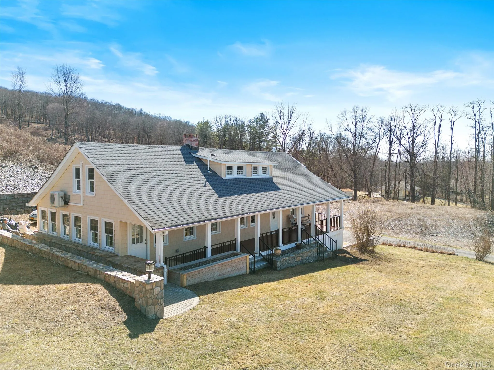 Side View of property with covered porch, roof with shingles, a lawn, and a chimney Side View of property with covered porch, roof with shingles, a lawn, and a chimney