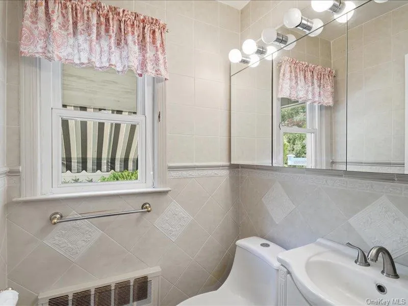 First Floor Half Bath off Kitchen First Floor Half Bath off Kitchen