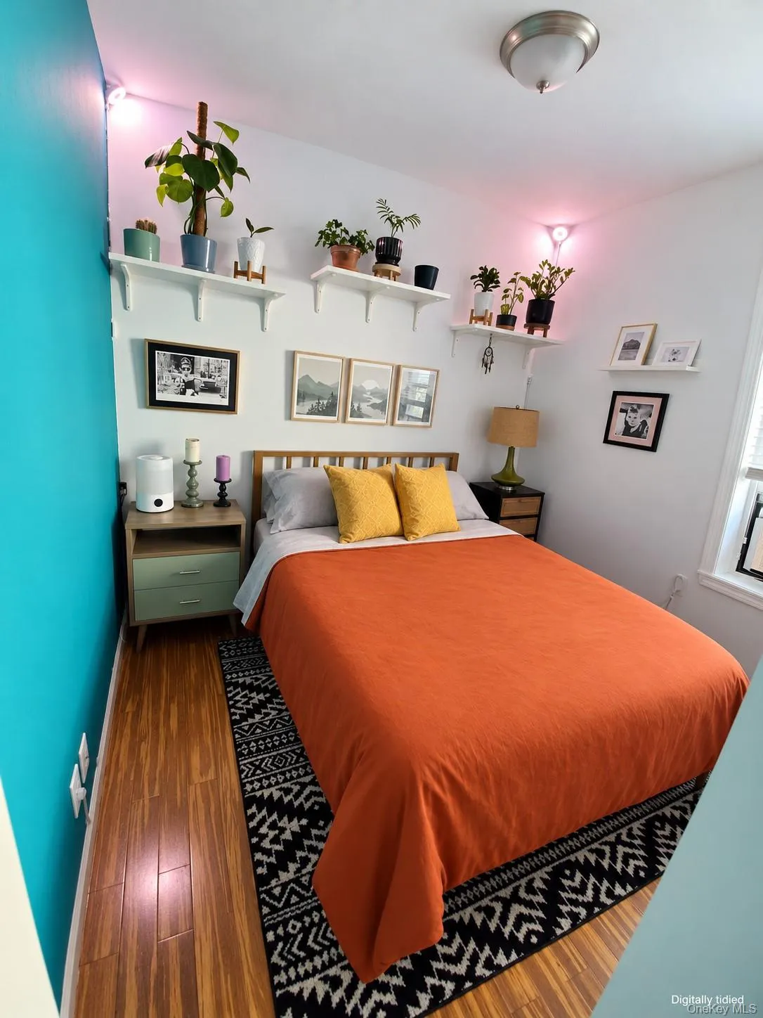 Wood-finish flooring with a contrasting accent wall Wood-finish flooring with a contrasting accent wall