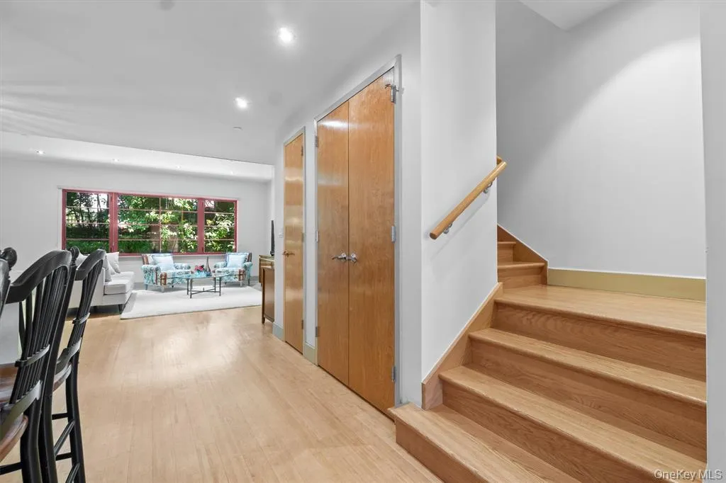 Stairs with recessed lighting and wood finished floors Stairs with recessed lighting and wood finished floors