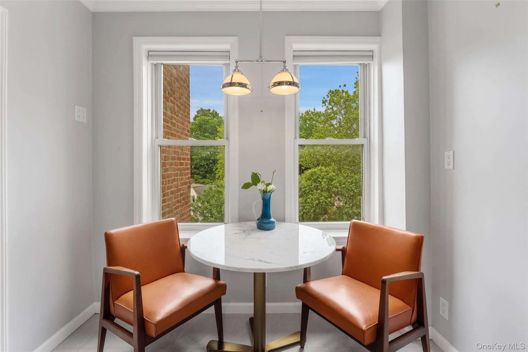 Dine-in Kitchen with 2 windows and tree-to[ views. Dine-in Kitchen with 2 windows and tree-to[ views.