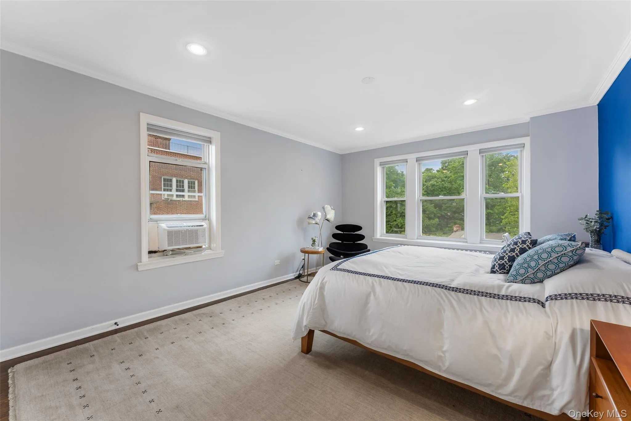 Expansive bedroom with gorgeous light, recessed lighting and two exposures. Expansive bedroom with gorgeous light, recessed lighting and two exposures.