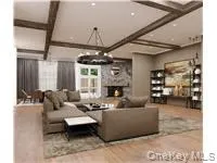 RENDERING - Living room finished concept with actual stone fireplace feature. RENDERING - Living room finished concept with actual stone fireplace feature.