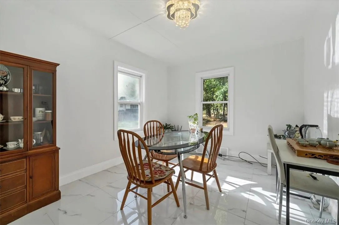 Dining room featuring a wealth of natural light Dining room featuring a wealth of natural light