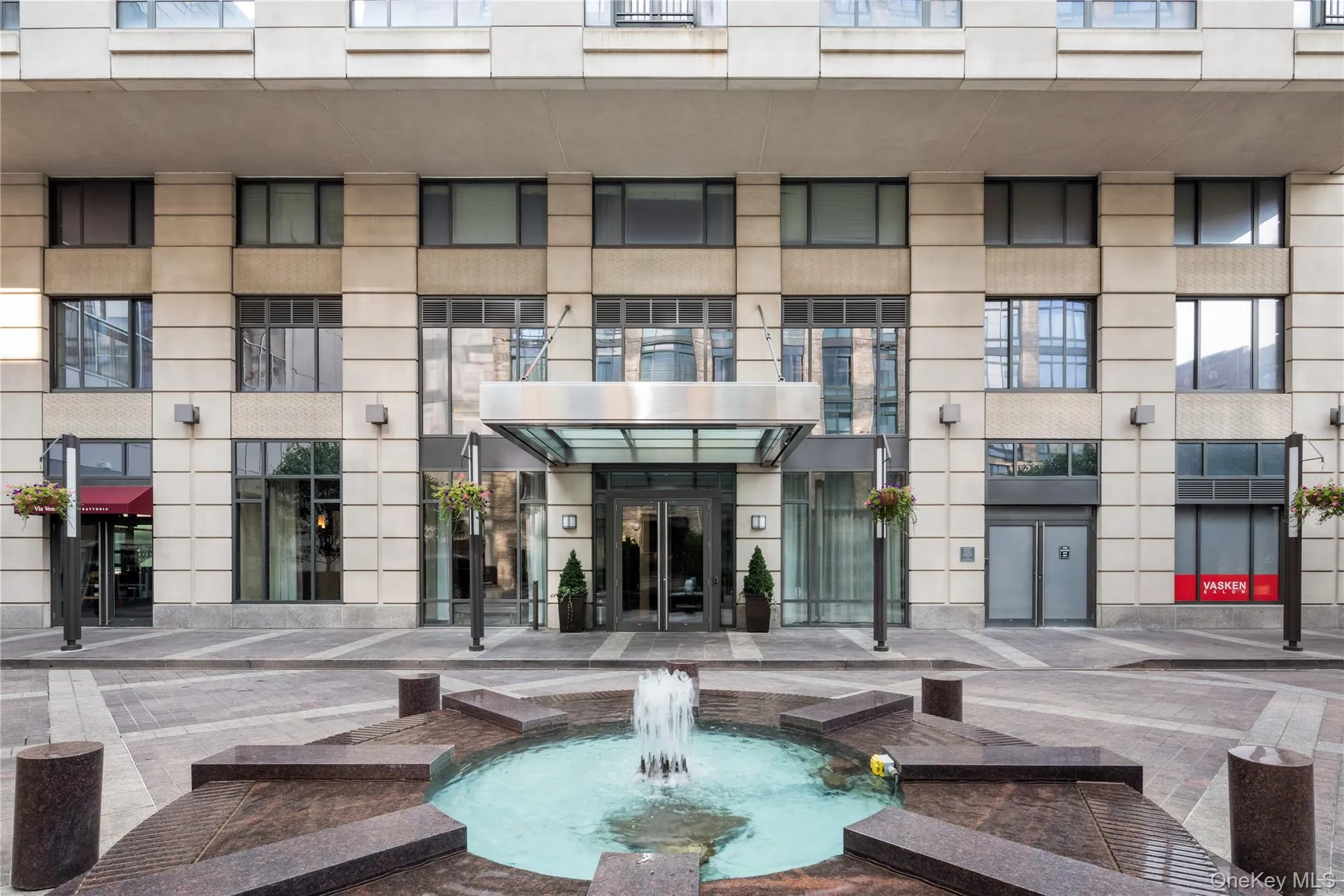 Front of Building and Lovely Courtyard. Front of Building and Lovely Courtyard.